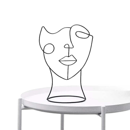 Abstract Iron Silhouette Sculpture with Matte Black Finish - Home by Lorena
